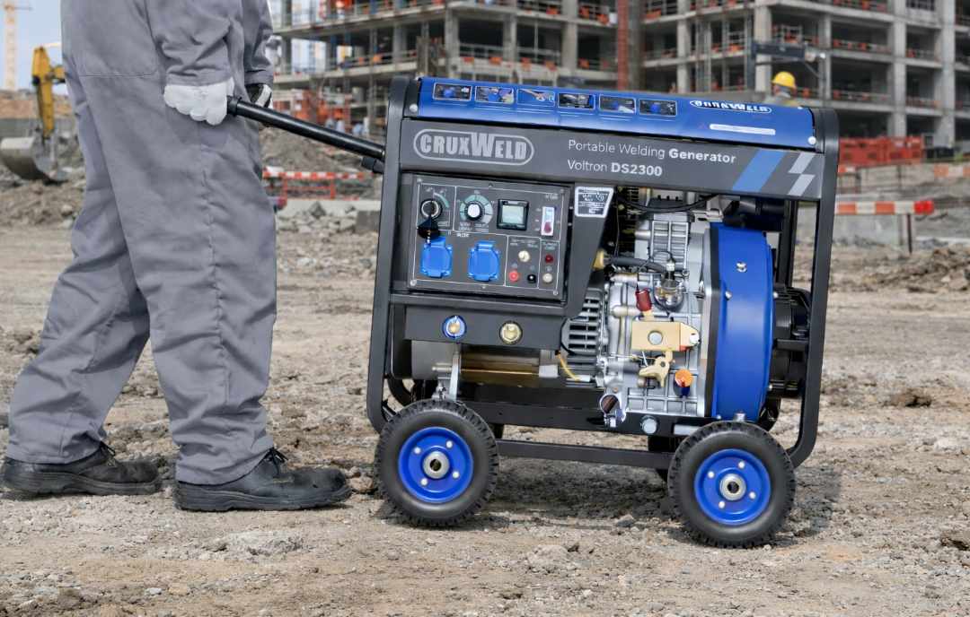 Voltzen DS2300 portable welding generator being wheeled across a construction site