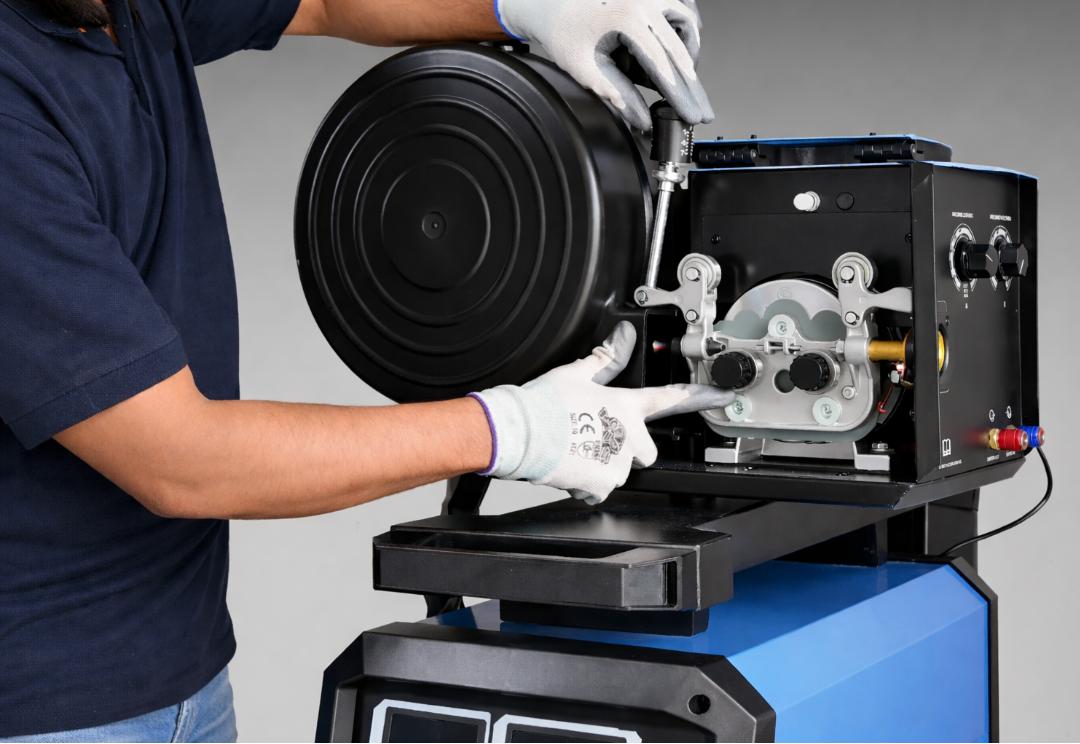 Loading a wire spool into the CWMIG500P wire feeder
