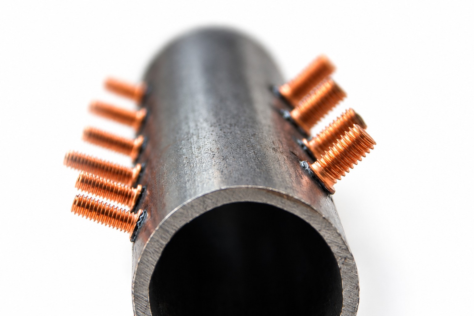 CD studs welded around a steel pipe