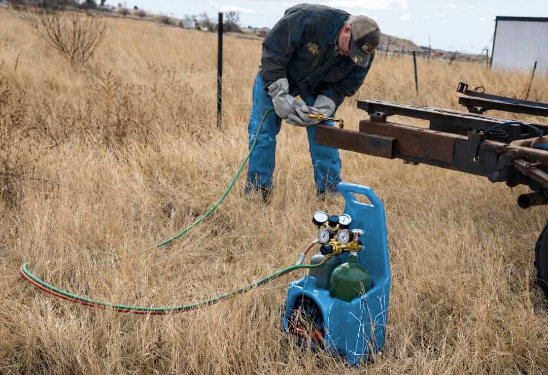 Cut-n-Weld ProX portable kit used for field repair work on a farm