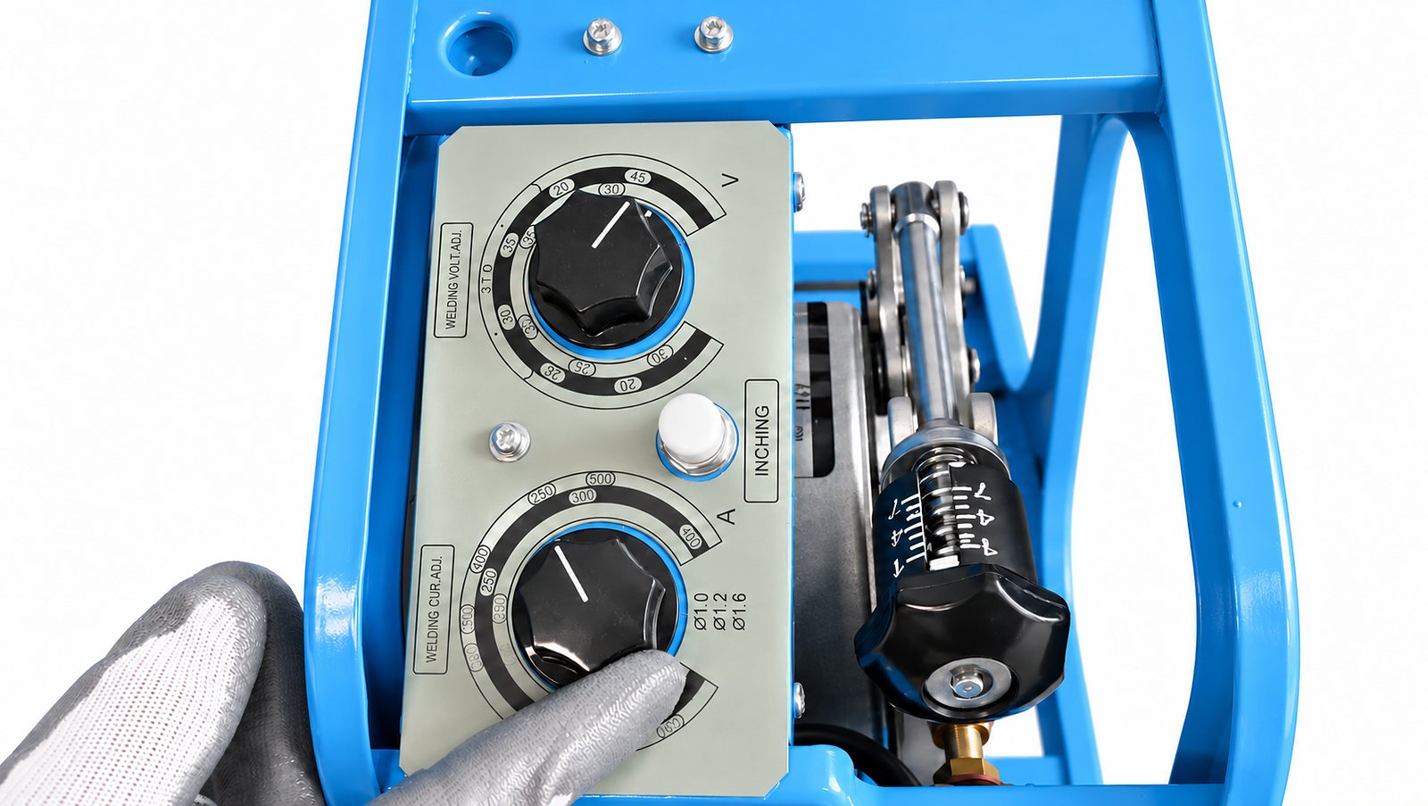 Wire feeder voltage and current dials with inching button