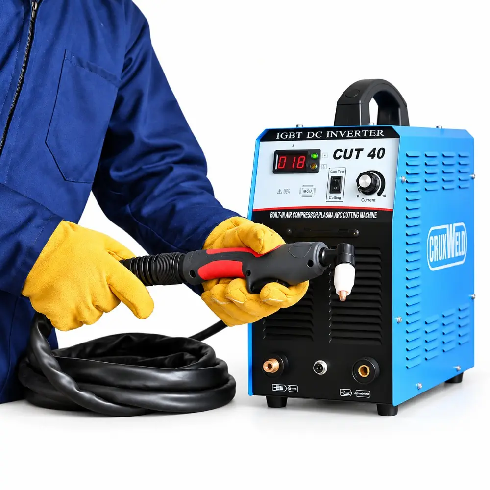 Operator holding the FINELINE 40C plasma torch ready to cut