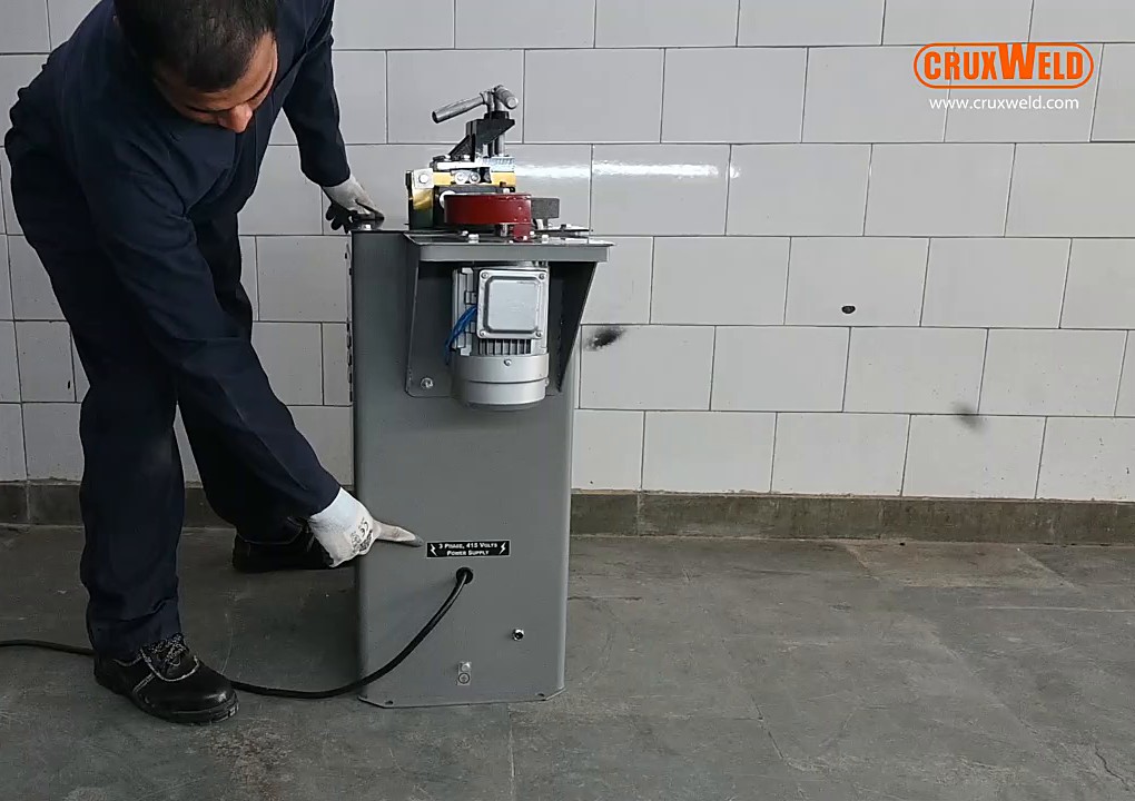 Operator at the UltraFlex 520 bandsaw blade butt welder with foot switch